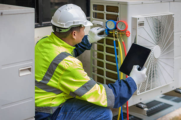Professional Hvac technician working in Winchester, MA